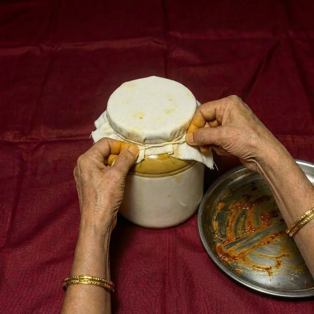 Hands preserving a jar ideology image